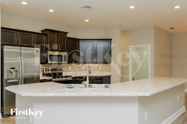 Building Photo - 5952 Valentino Way