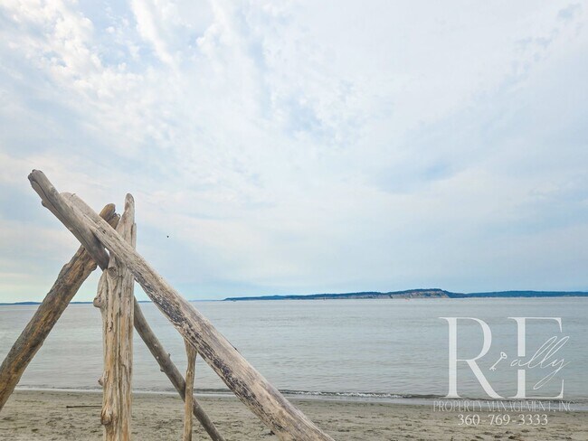 Building Photo - Private Beach Access – Bright, Breezy Livi...