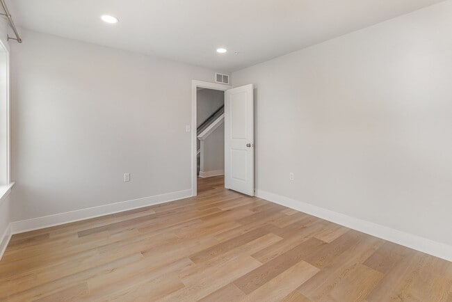 Building Photo - Modern 2025 Townhome | Open-Concept Living, Chef’s Kitchen with Large Island & 2-Car Garage