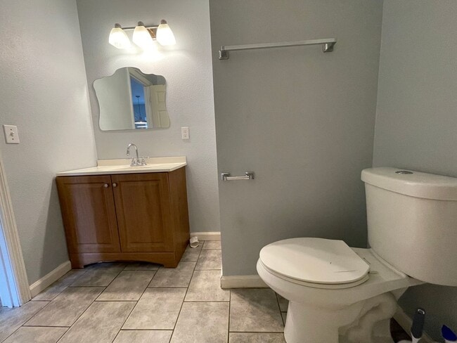 Building Photo - Open floor plan, four-bedroom two-bathroom with washer and dryer