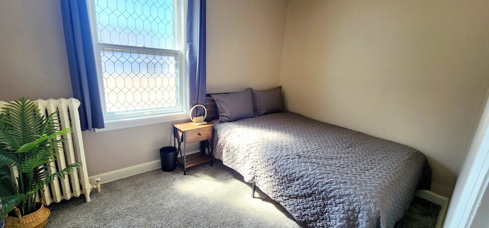 OEKO-TEX bedding in a quiet nook, made for rest. - 822 E 4th St