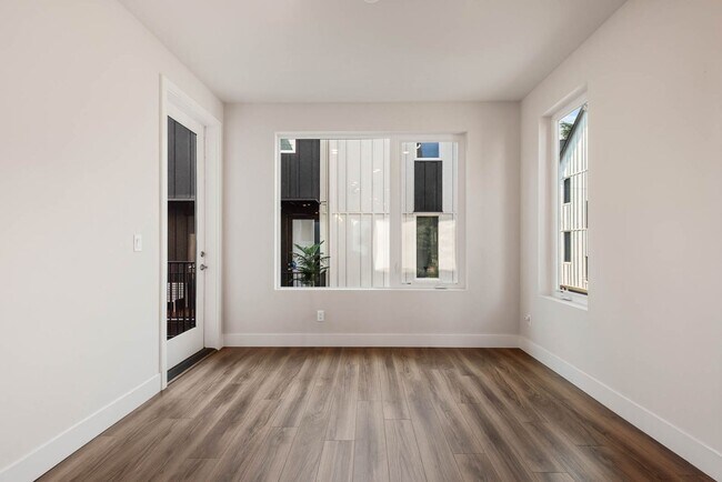 Building Photo - Contemporary Townhome with Attached 2-Car Garage