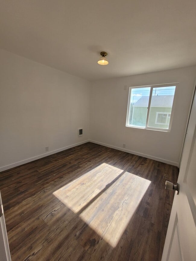 Building Photo - Free May rent with 1 Year Lease - Fully Remodeled with Garage & Yard Care Included