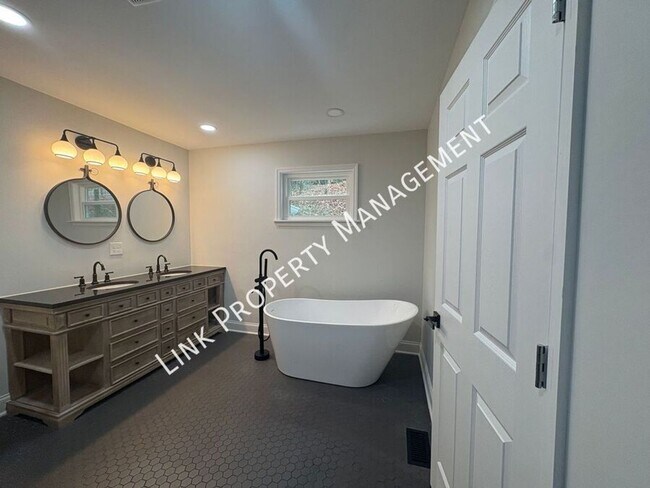 Building Photo - JUST REDUCE!  Sophisticated Tri-Level Home in Stuart Heights — Modern Comfort & Timeless Charming...