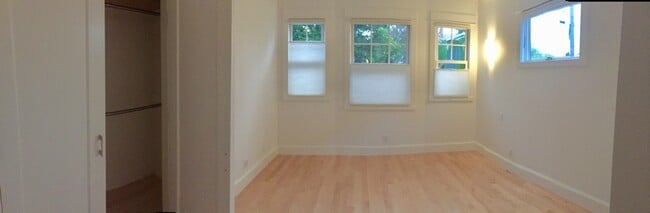 Shades on windows extend up and down optimize privacy and light - 3918 Webster St