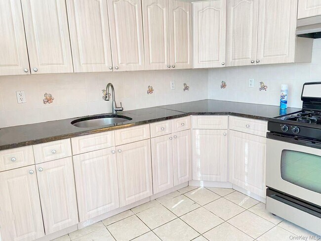 Building Photo - 248-03 Depew Ave