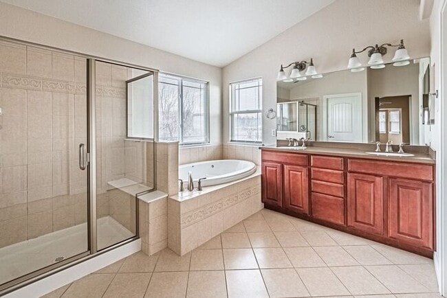 Building Photo - Stunning 5BR Home with Luxury Master Suite & Low-Maintenance Yard!