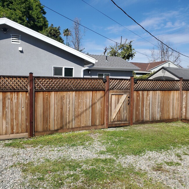 Private locking entry gate from parking area. - 5731 Fulton Ave
