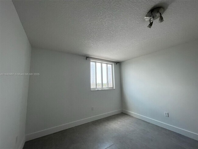 Building Photo - 8888 Collins Ave
