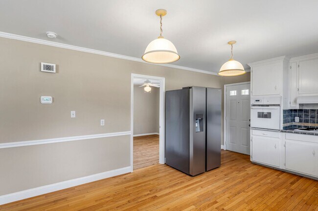 Building Photo - Large Renovated Ranch Home, Two Kitchens & Two Living Areas, Hardwood Flooring, Deck, Fenced!