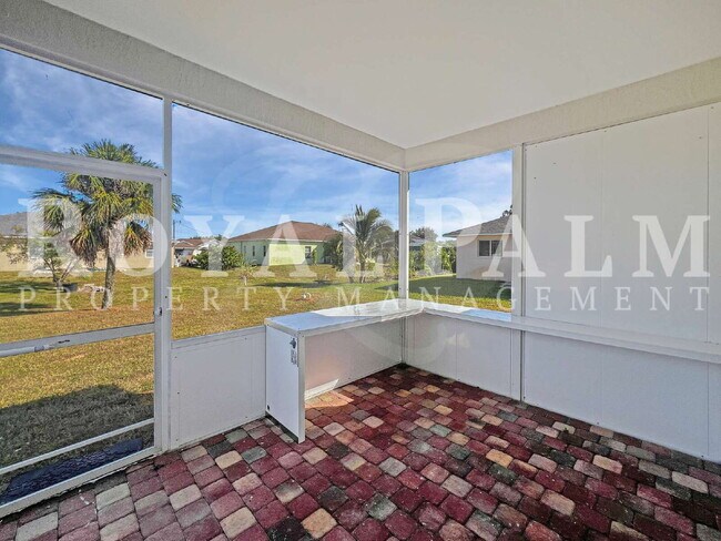 Building Photo - 3BR/2BA Home Ready to Bloom in Lehigh Acres + GARAGE!!