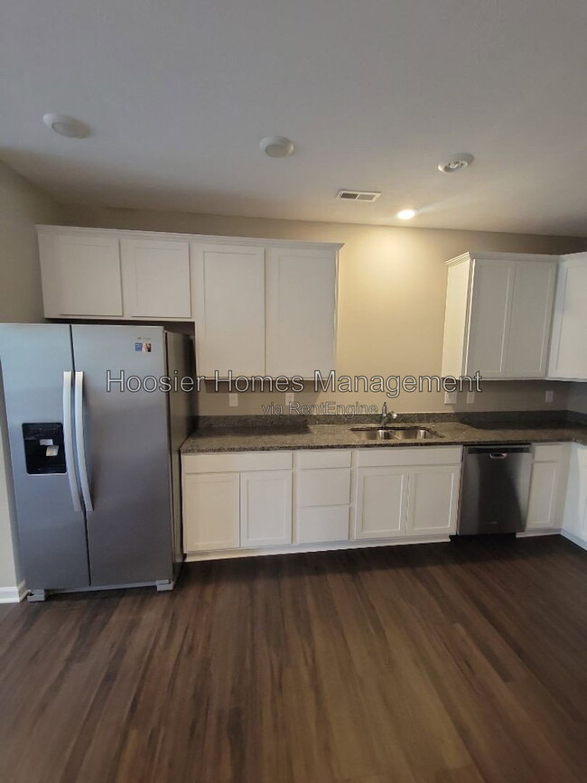 Building Photo - 5636 Brownstone Dr