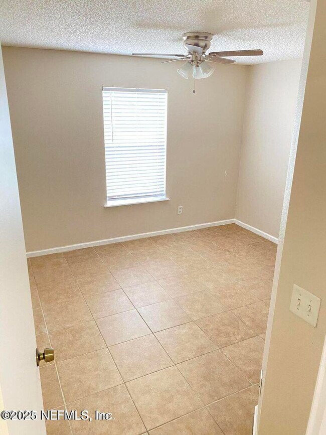Building Photo - 5646 Chirping Way W