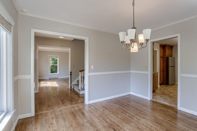 Building Photo - A Home With Character Walking Distance To ...