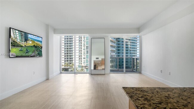 Building Photo - 10275 Collins Ave