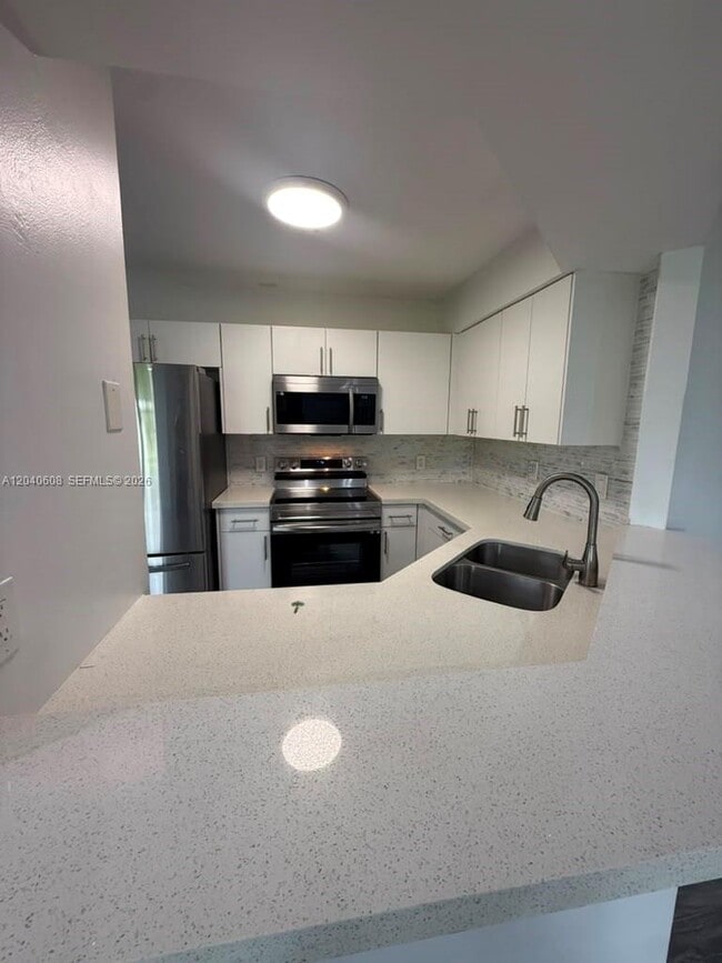Building Photo - 9021 W Sunrise Blvd