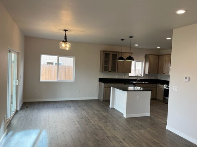 Building Photo - ALMOST NEW CONSTRUCTION/ 4 BEDROOM IN NEWER UPCOMING NEIGHBORHOOD