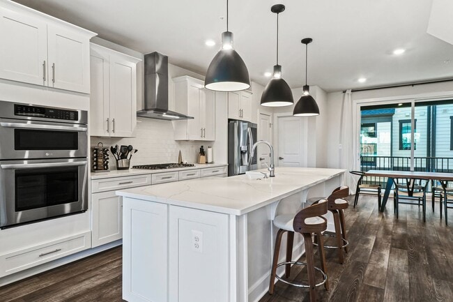 Building Photo - Your new home awaits you! Luxury Townhouse...