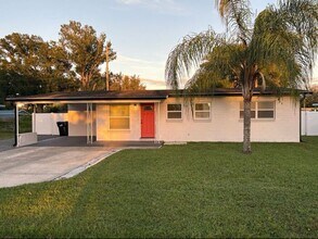 Building Photo - 3 Bedrooms on a fenced back yard and a sough after school zone Lawn Care included