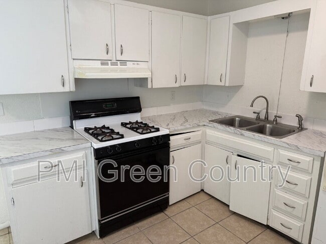 Building Photo - 1412 S 73rd E Ave