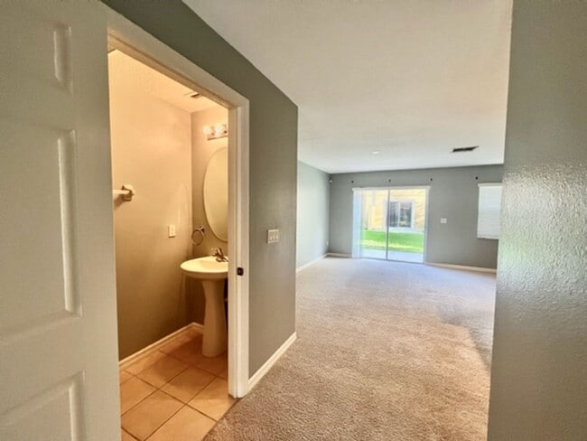 Building Photo - AVAILABLE NOW! Charming 2 Beds 2.5 Bath Townhome! 2 MASTER SUITES! Attached one car garage!! Extr...