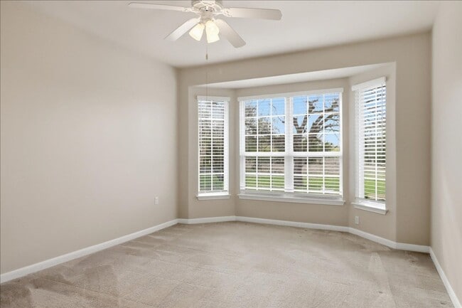 Building Photo - 809 Whispering Wind Dr