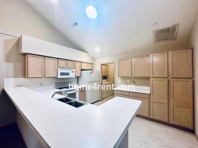 Building Photo - Maintenance FREE, Ranch Style Townhome w/ ...