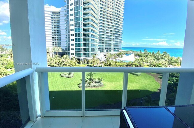 Building Photo - 10275 Collins Ave