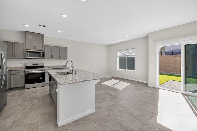 Building Photo - GENTLY USED 2024 HOME - 5 BEDROOMS WITH A FINISHED BACKYARD