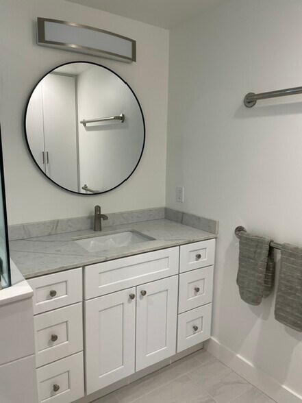 Lovely new bathroom vanity. tall storage/linen closet is behind you from this photo. - 101 Granlee Rd