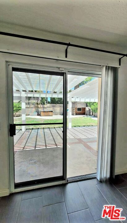 Building Photo - 15180 Carnation St