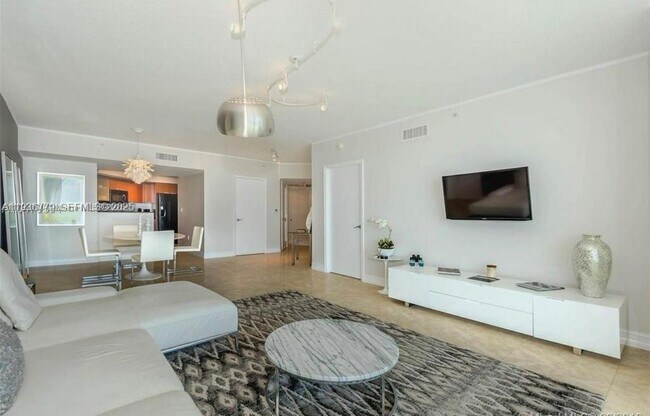 Building Photo - 16699 Collins Ave