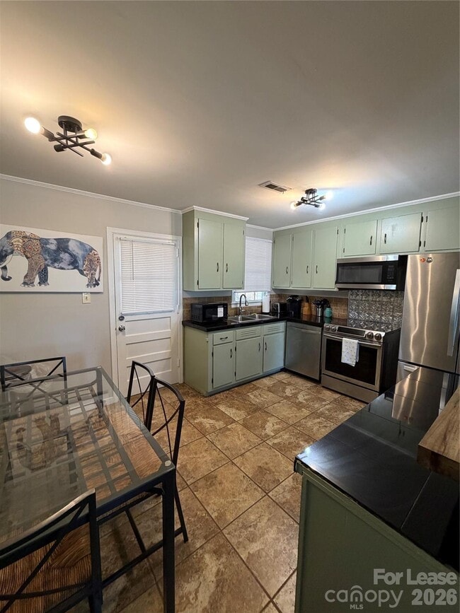 Building Photo - 4609 Connecting Rd