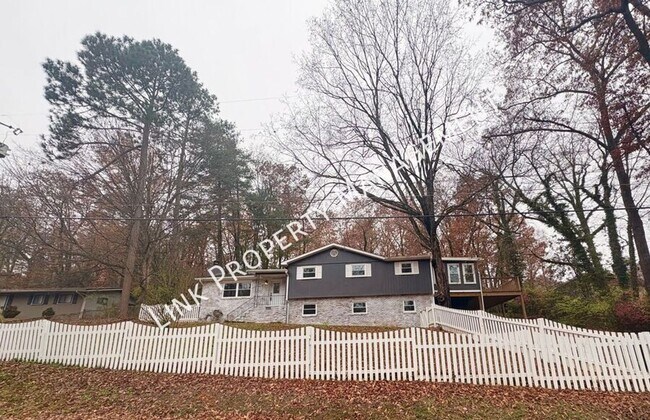 Building Photo - JUST REDUCE!  Sophisticated Tri-Level Home in Stuart Heights — Modern Comfort & Timeless Charming...