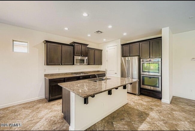 Building Photo - 10824 E Quintana Ave