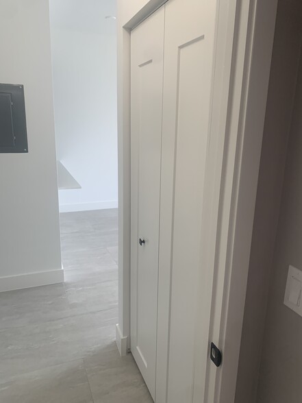 Stackable Washer/ Dryer behind door - 511 Lucerne Ave