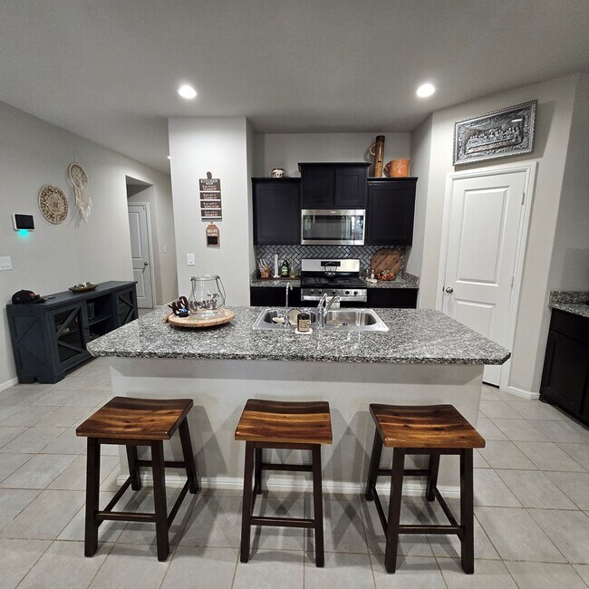 Building Photo - 7003 Adenium Rd