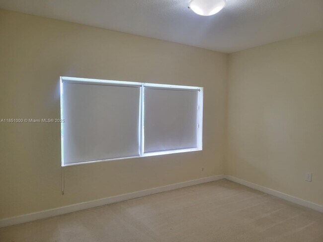 Building Photo - 6671 NW 107th Ct