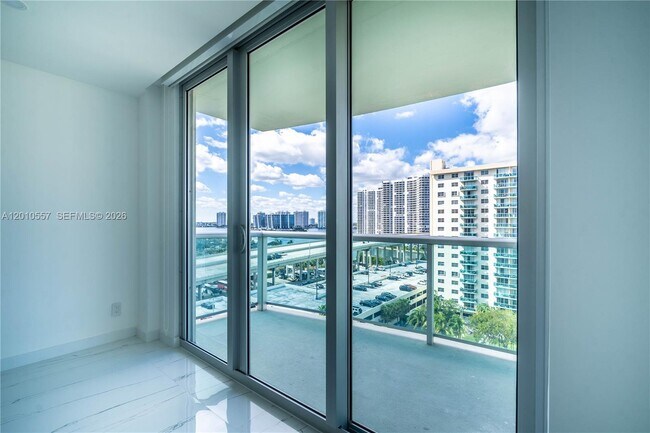 Building Photo - 19380 Collins Ave