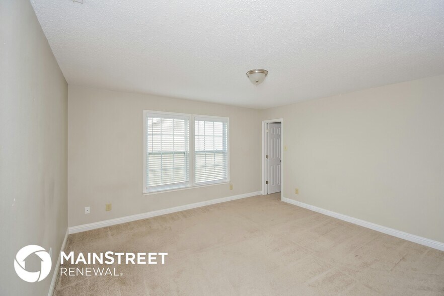 Building Photo - 8208 Firefly Way