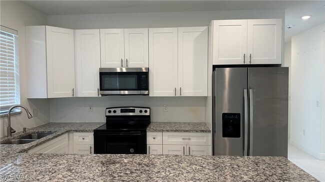 Building Photo - 5901 Rita Ave N