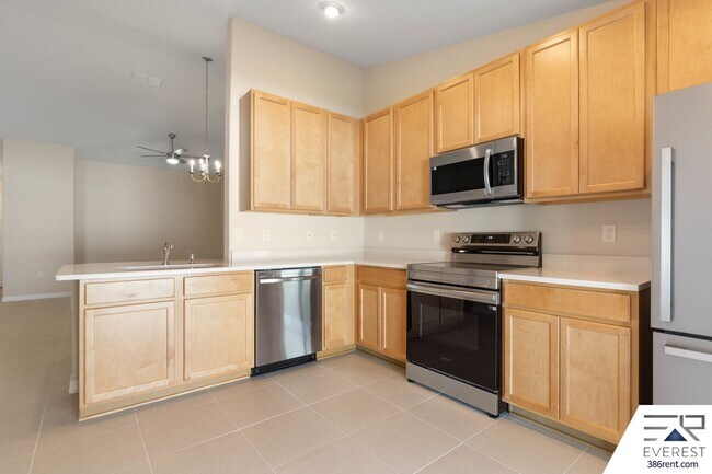 Building Photo - FULLY FENCED, LIKE NEW 3/2/1 TOWNHOUSE ON A CUL DE SAC IN BEAUTIFUL SEMINOLE WOODS
