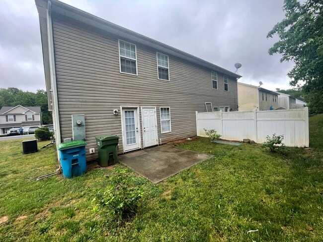 Building Photo - This two-story, 4-bedroom, 2-bath duplex in Fort Mill, SC sits on a corner lot