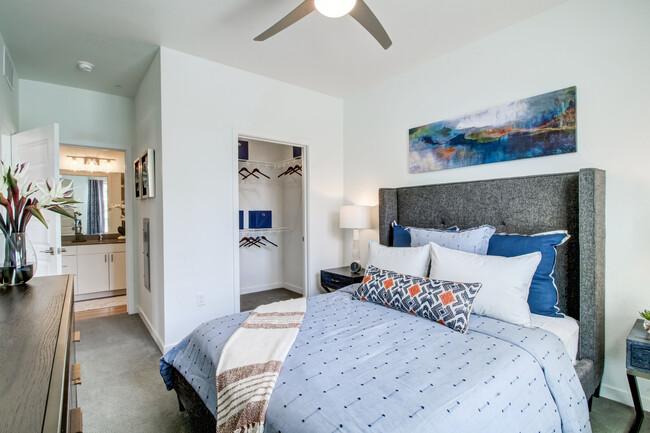 Bedroom with ceiling fan and carpeted flooring - Avalon Flatirons