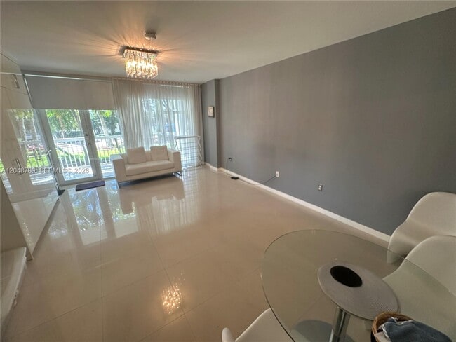 Building Photo - 10275 Collins Ave