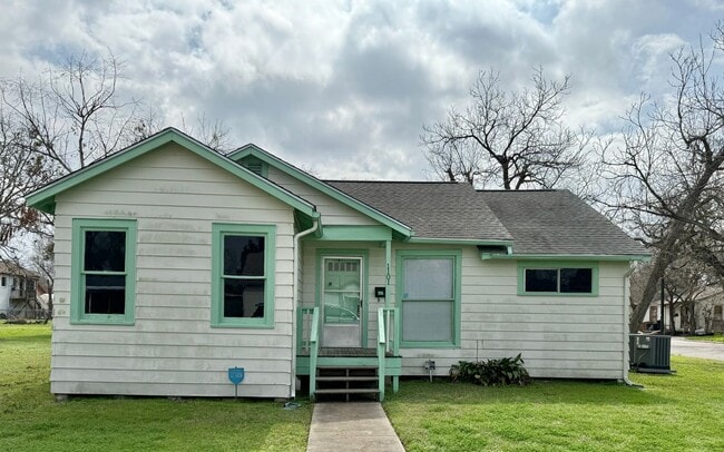 Primary Photo - Spacious home with room to play outdoors.