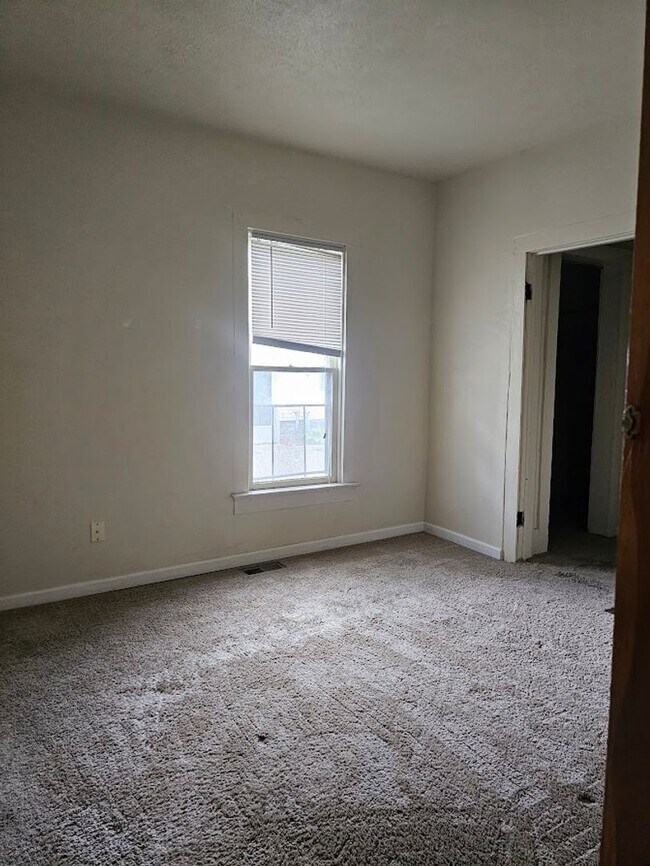 Building Photo - Two Bedroom One Bath Lower Duplex with W/D Hookup