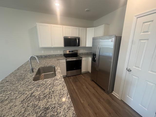 Building Photo - REDUCED PRICE & 1/2 Off First Month's Rent with move-in by 12/22 "Spacious 3-Bedroom Townhouse Re...