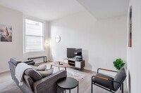 Building Photo - 9-JAN-JAN E 4th St