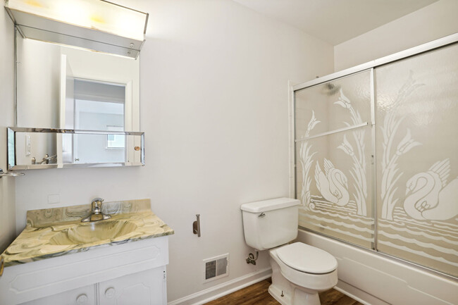 Upstairs full bathroom includes tub + shower! - 8407 Alameda Ct